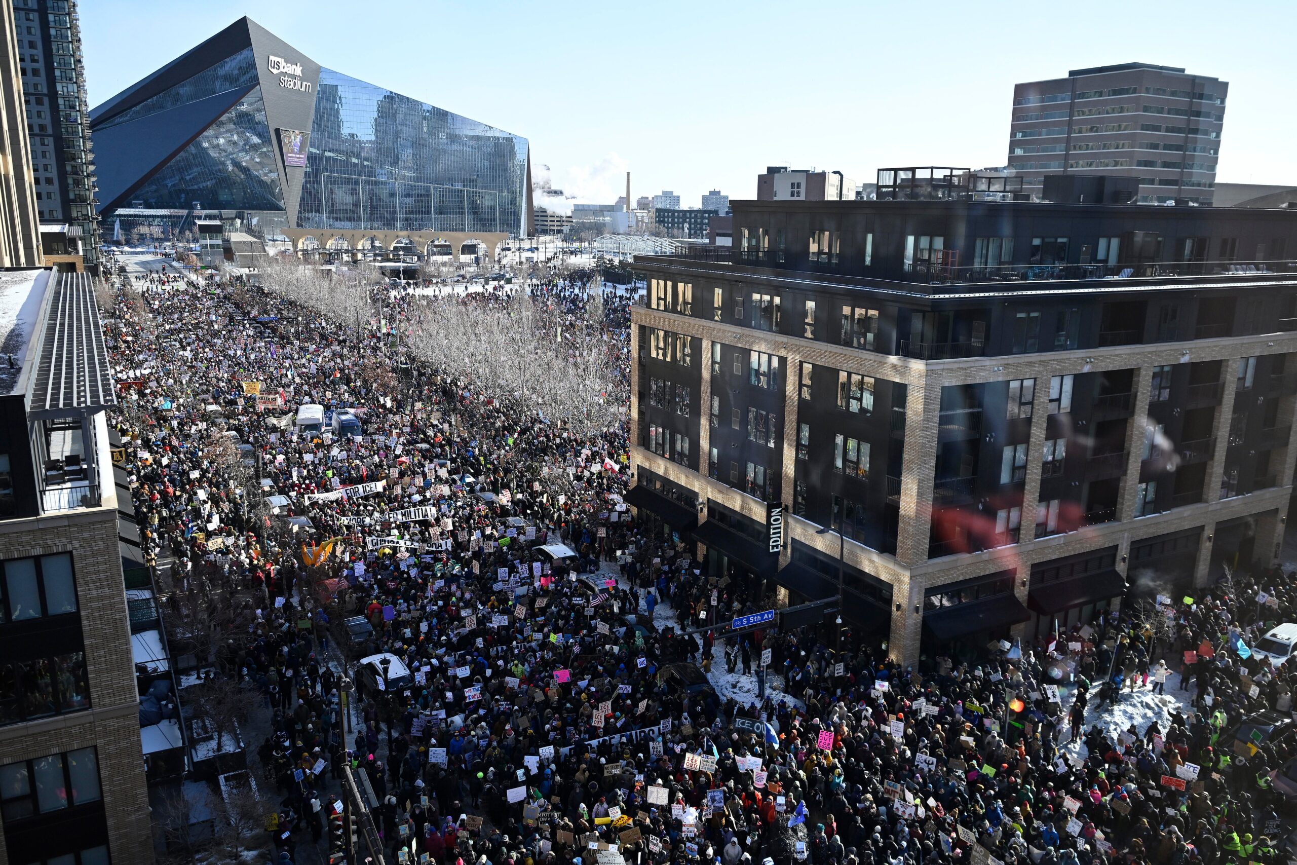 Thousands march through downtown Minnapolis protesting against ICE as state workers hold general strike