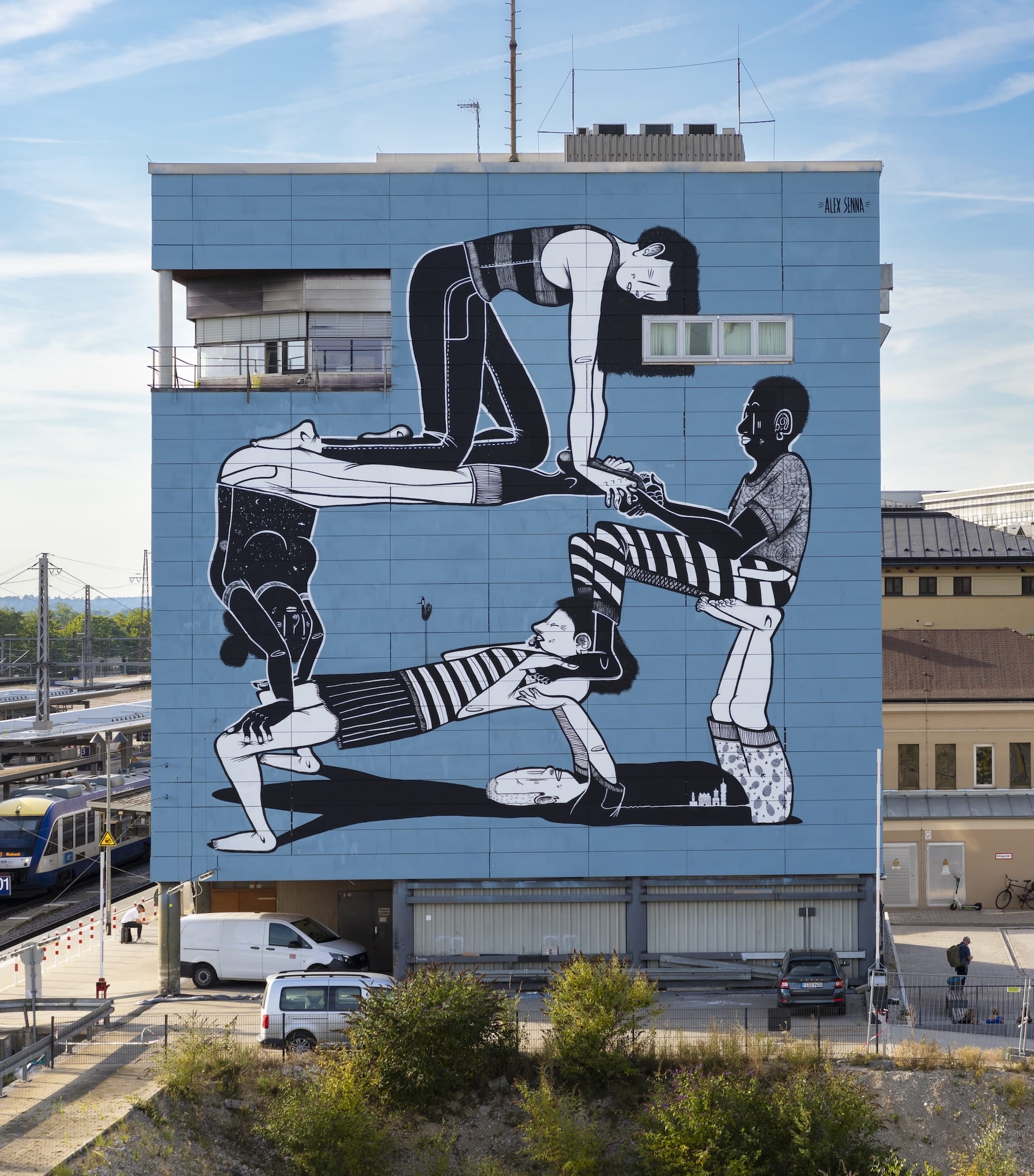 Amid Urban Spaces, Alex Senna's Bold Murals Embrace Connection and Belonging